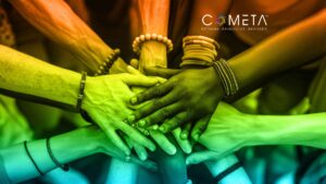 Close-up of diverse hands stacked together, symbolizing unity and collaboration. This image emphasizes the importance of diversity, equity and inclusion in fostering social justice and collective progress.